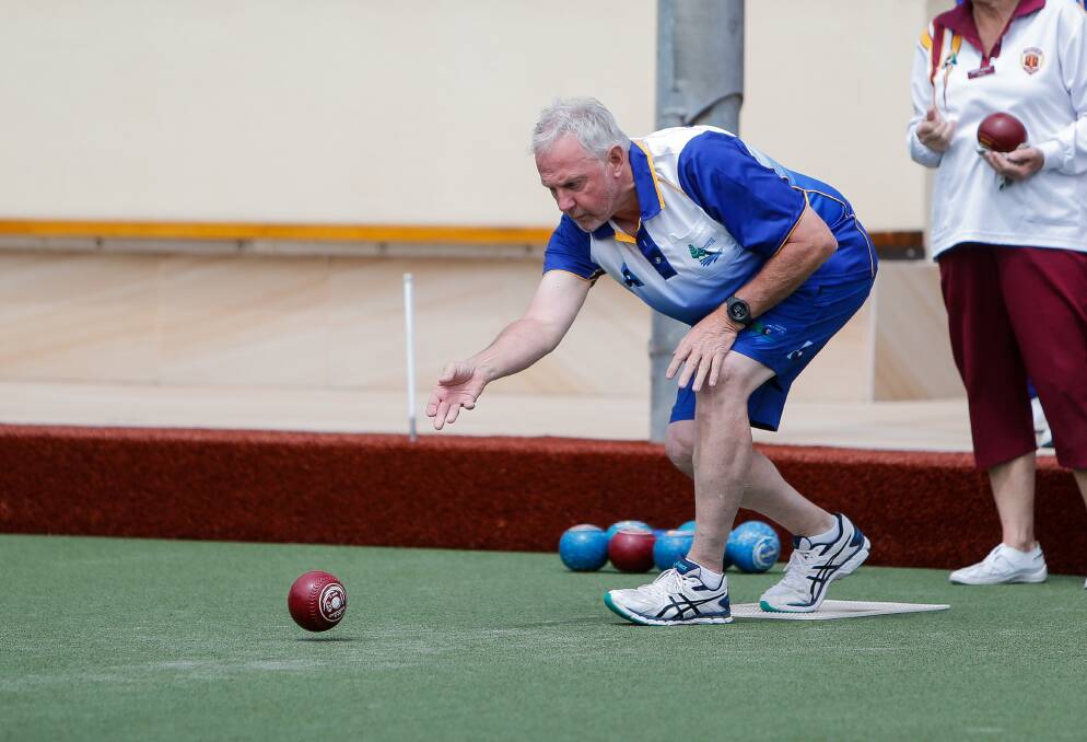 BALANCED: Warrnambool Gold's Ray McGilvray keeps his form as he follows through after releasing his bowl. Picture: Anthony Brady