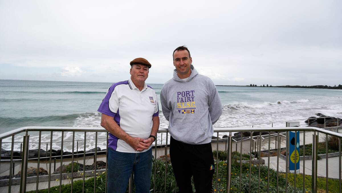 CHANGING OF THE GUARD: Ian Powell with new Port Fairy Lifesaving Club president Adam McCosh. Picture: Anthony Brady