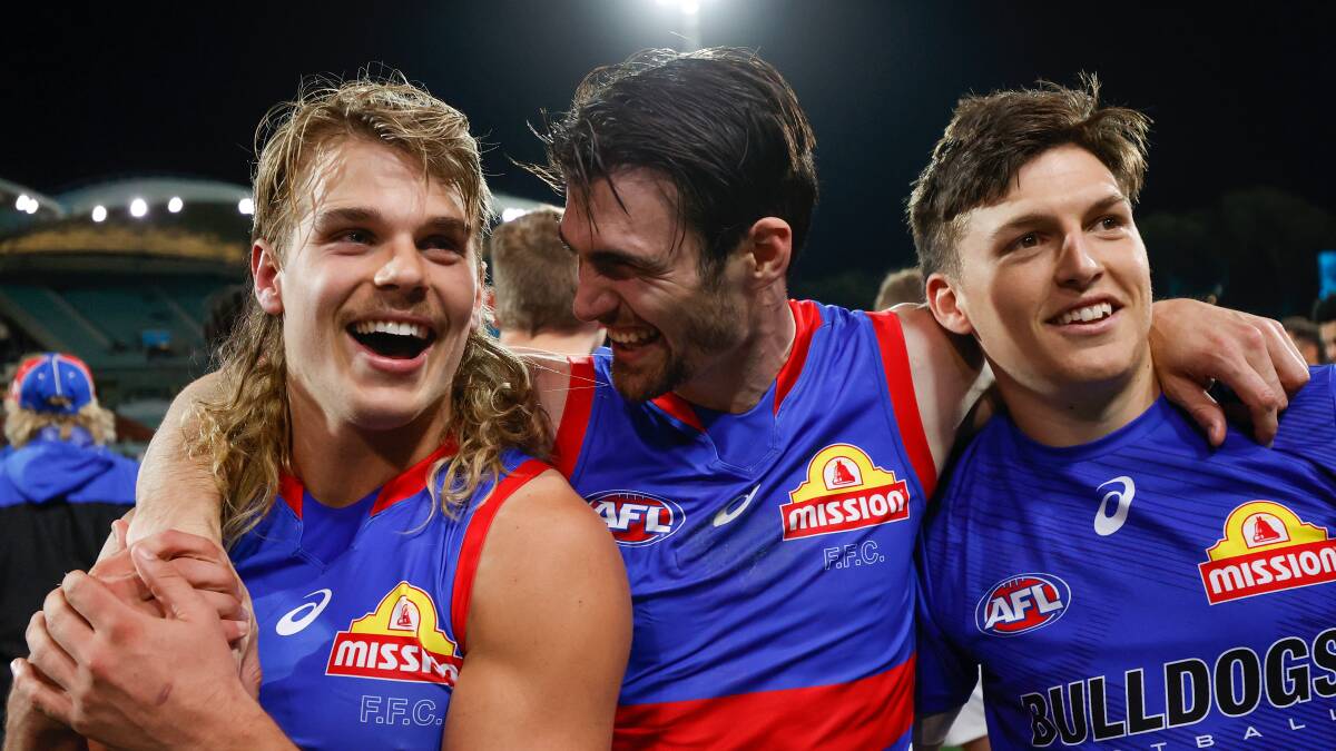 HAPPY SCENES: I'm hoping to see more moments like this with Bailey Smith, Easton Wood and Laitham Vandermeer on Saturday night. Picture: Getty Images