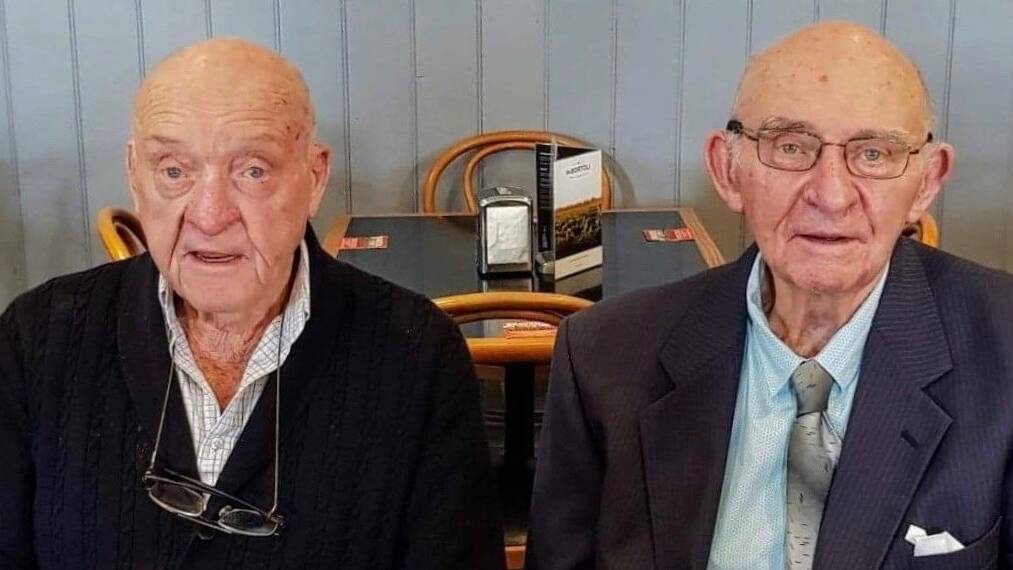 BROTHERS: Colin and Brian Lane pose for a photo. Colin played in the 1958 Port Fairy premiership side while his brother was first emergency. 