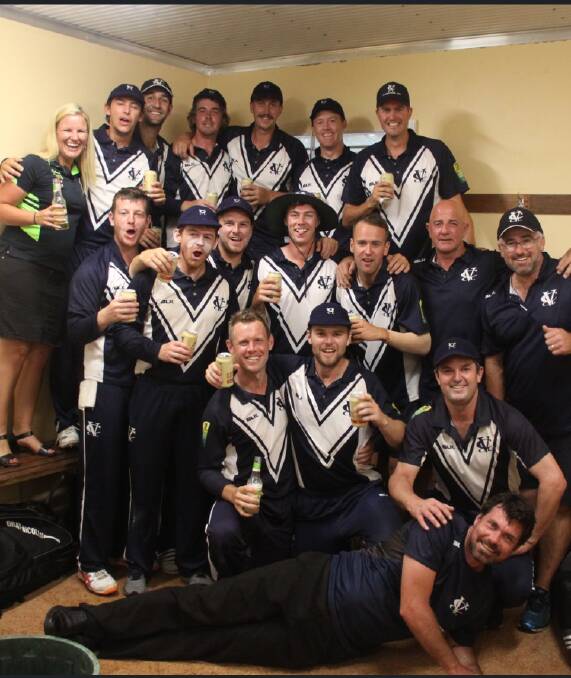 CHEERS: Vic Country players celebrate their victory on Saturday.