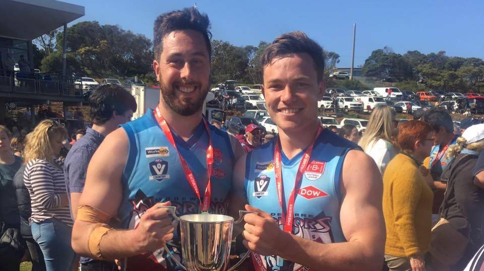 FAMILY TIES: George Swarbrick III (right) has signed on with Port Fairy, the club his grandfather and father are legends of.