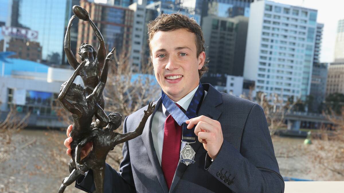 STAR IS BORN: Lewy Taylor poses for a photo after winning the Rising Star award in 2014. Picture: Getty Images