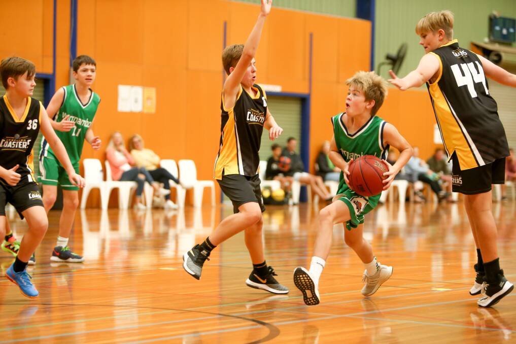 ON THE DRIVE: Warrnambool's Louis Greene heads towards the ring for a lay up. Picture: Chris Doheny