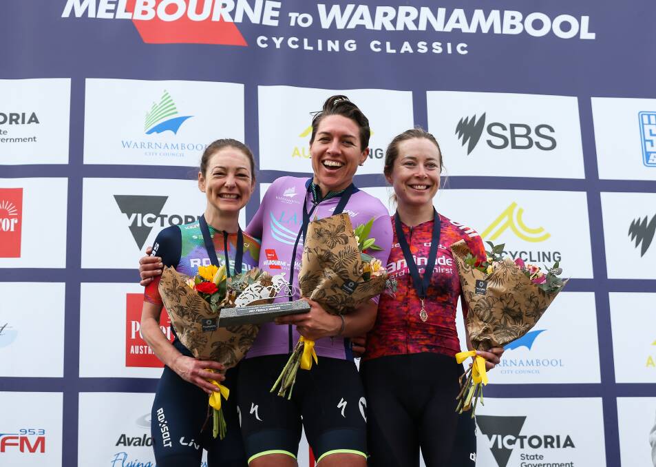 ALL SMILES: The women's podium of Justine Barrow, Matilda Raynolds and Nicole Frain enjoy their moment. Picture: AusCycling/Con Chronis