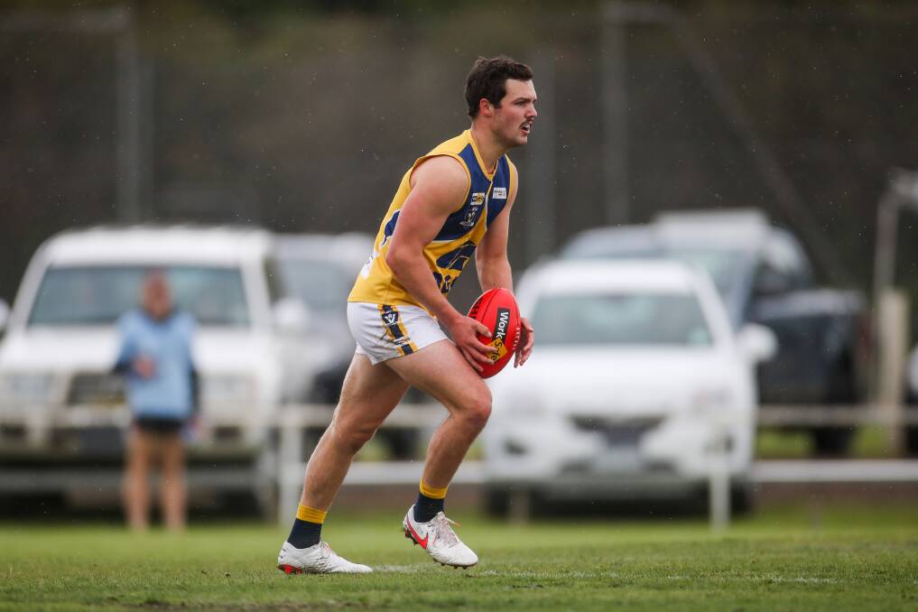 SETTLING IN: North Warrnambool Eagles' Jackson Grundy looks for a teammate. Picture: Morgan Hancock