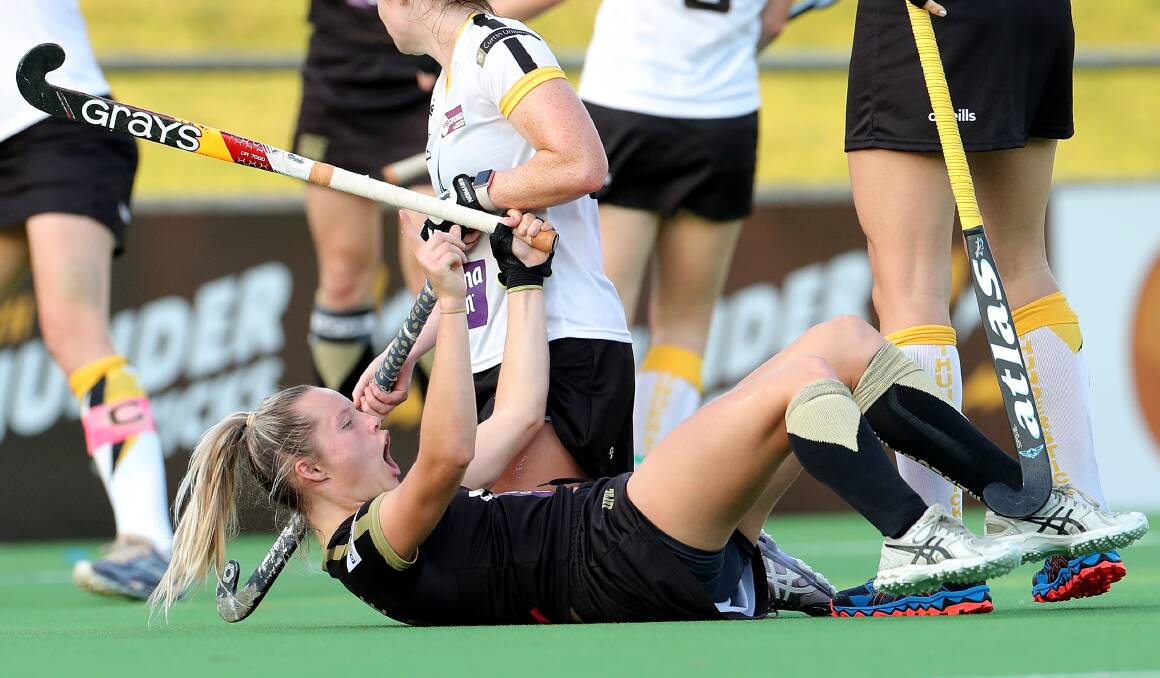 'YES!': Madi Ratcliffe celebrates one of her six goals in Hockey One League this season. Picture: Hockey Club Melbourne/AAP