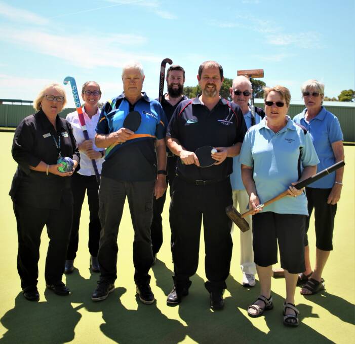 TESTER: City Memorial Bowls Club, Warrnambool City Croquet Club, Warrnambool Table Tennis Association and Warrnambool District Hockey Association representatives encourage residents to have a go at their sports.