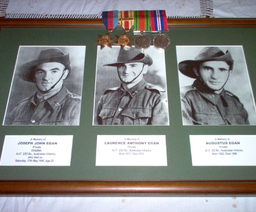 Finally honoured: Warrnambool's Private Joseph John Egan, pictured on the left, died while serving in Tobruk during World War II. His great-nephew Kelvin Johnston has been fighting for his medals to be reissued since 2004.