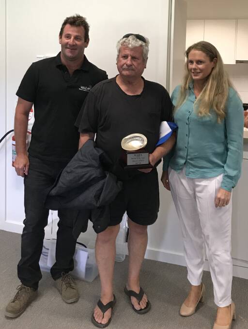 Western Abalone Divers Association chair Craig Fox, 'Deckie of the Year' recipient Dave Sharp and Victorian Fisheries Authority deputy chair Bernadette Northeast.