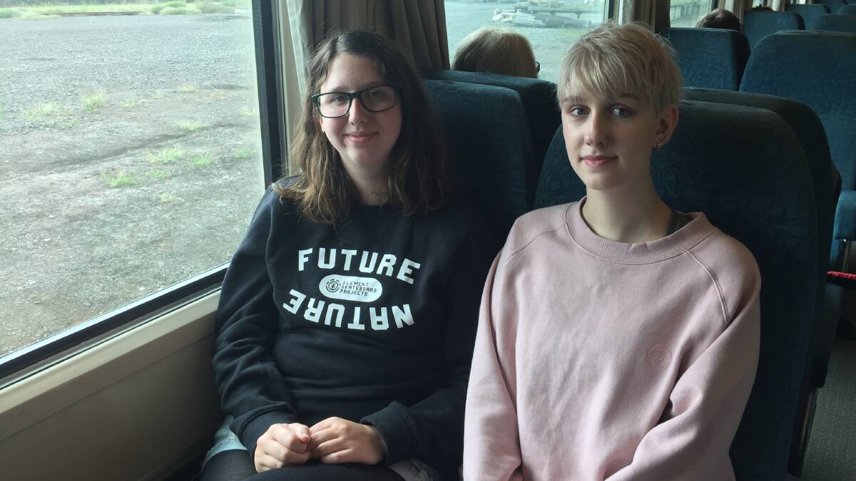Sisters Tzigane and Elektra Scholz , from Hawkesdale, regularly catch the train to Melbourne for social reasons.