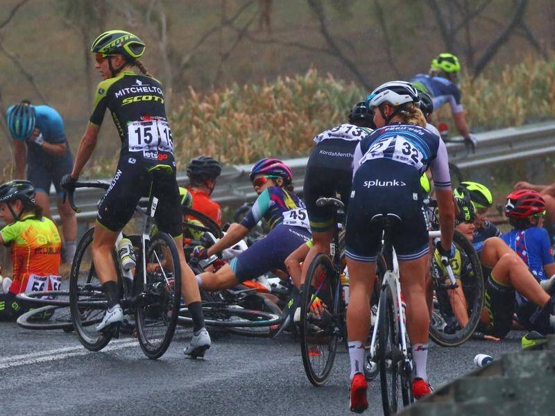 Cyclists crashed about 24km from the finish in the women's World Tour season-opener at Geelong.