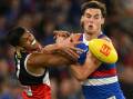 Teenager Sam Darcy (r) will miss the next two Western Bulldogs AFL matches with a fractured jaw. (Morgan Hancock/AAP PHOTOS)