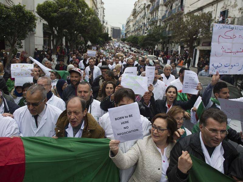 Long-running protests peaked on Friday when hundreds of thousands demonstrated in Algiers.