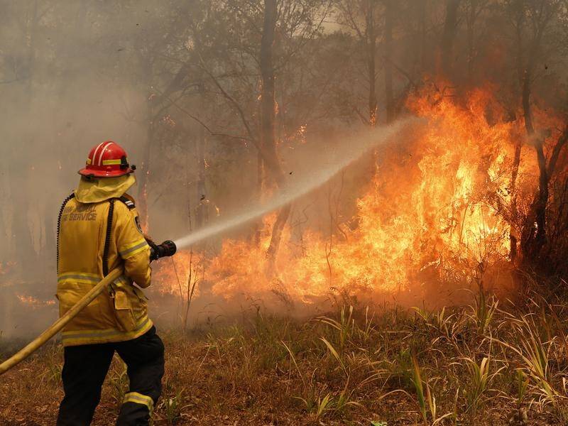 More than 120 fires are burning across NSW and Queensland.