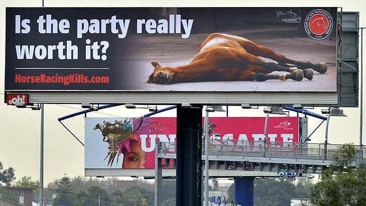 The controversial billboard greeting drivers near the Bolte Bridge - just before another marking the start of the 'unmissable' spring racing carnival. Photo: Joe Armao