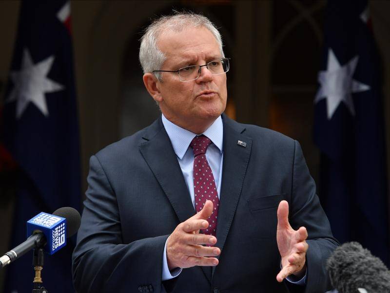 Scott Morrison says Australia is going through a 'gear change' in managing COVID-19, as cases soar.