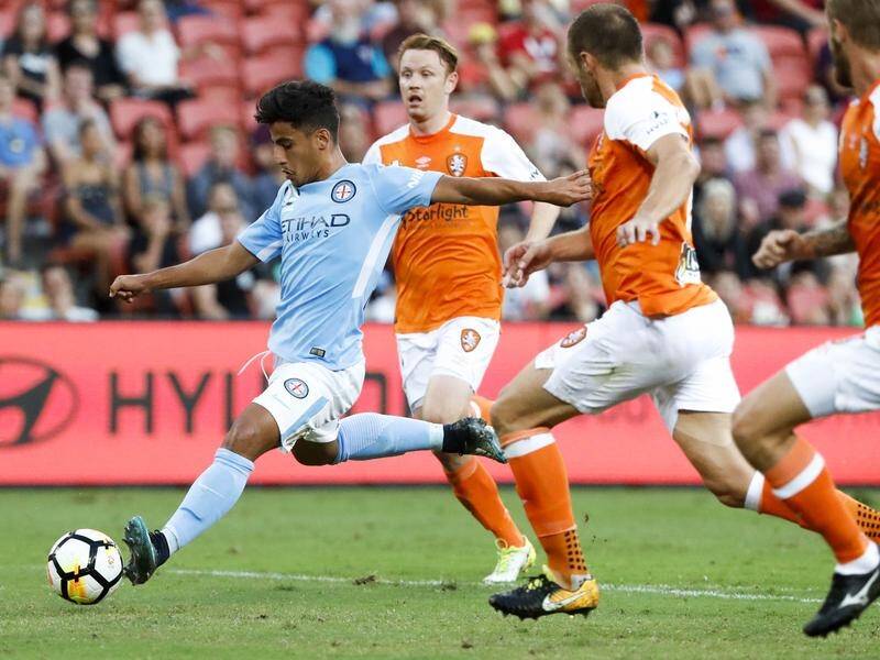 Melbourne City have come from a goal down to beat Brisbane Roar 2-1 in the A-League.
