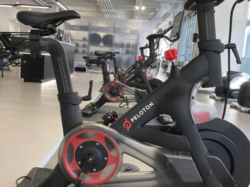 Peloton shares have plunged 24 per cent after a report of a temporary halt to production.