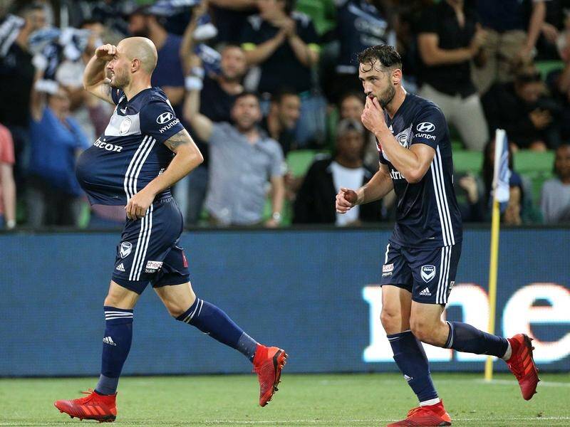 A late winning goal by James Troisi (L) for Melbourne Victory has cut the A-League ladder in two.