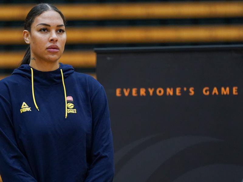 Australian basketballer Liz Cambage has backed away from her threat to boycott the Tokyo Olympics.