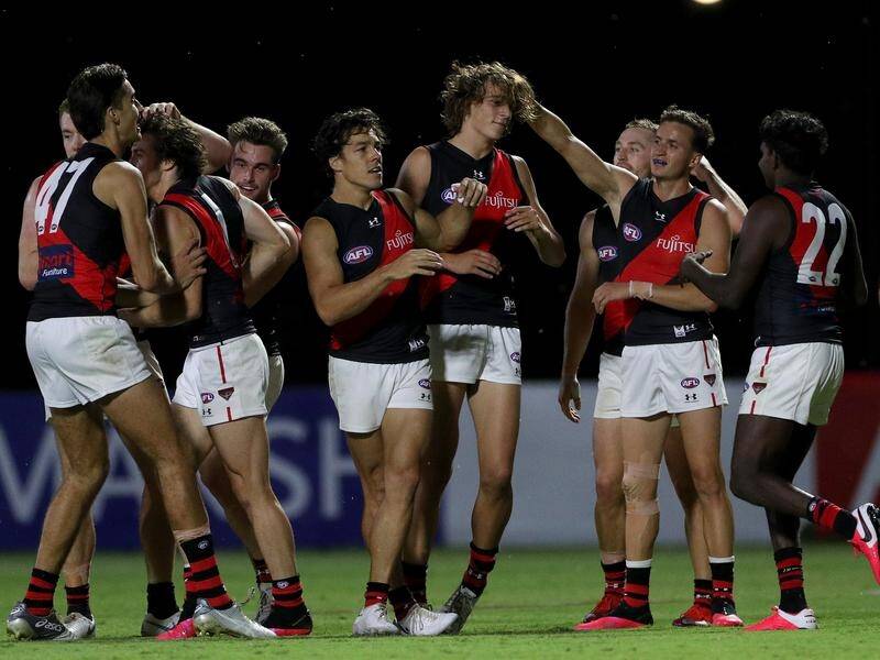 A depleted Essendon has beaten West Coast in a weather-affected AFL preseason trial in Perth.