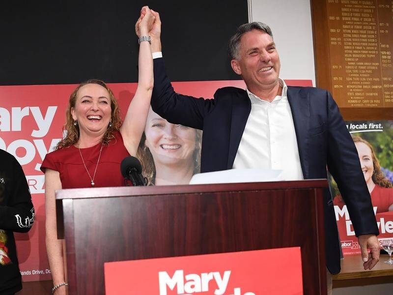 Mary Doyle and Deputy Prime Minister Richard Marles celebrate her win in the Aston by-election. (Julian Smith/AAP PHOTOS)