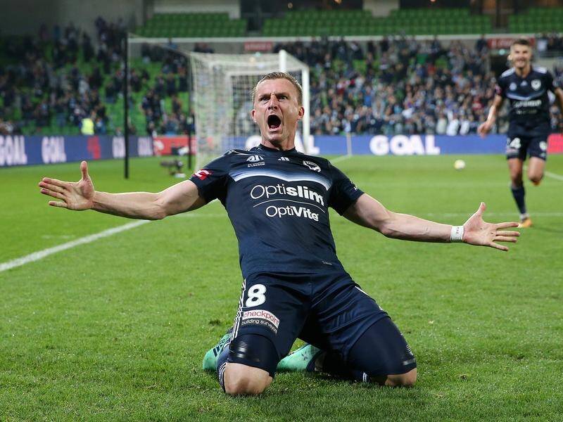 A Besart Berisha goal has given Melbourne Victory a win over Adelaide United and a semi-final spot.