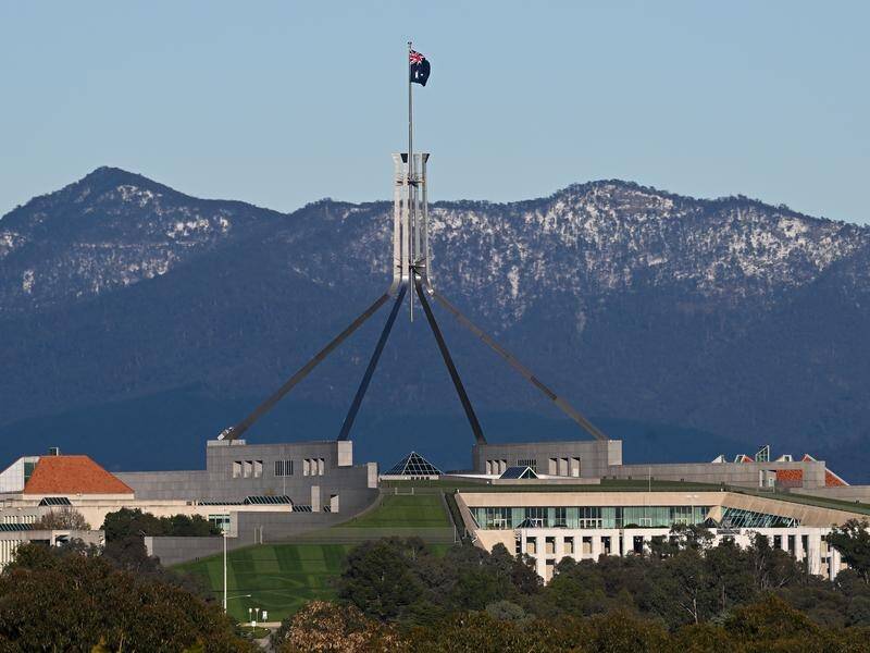 Temperatures have plunged in capital cities on the east coast, with snow on hills around Canberra. (Lukas Coch/AAP PHOTOS)