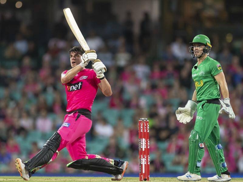 Moises Henriques has blasted 72 off 31 balls in the Sydney Sixers' rain-hit BBL win over the Stars.