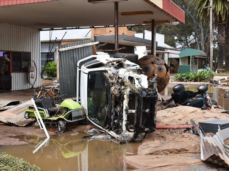 The body of a woman has been found in the flooded NSW town of Eugowra, while a man remains missing. (Murray McCloskey/AAP PHOTOS)