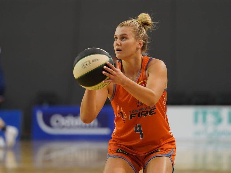 Shyla Heal will be coached by her father Shane after signing to join him at the Sydney Flames.