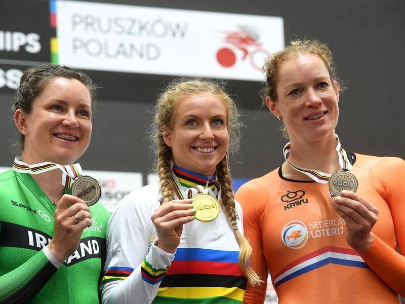 Australia's Alex Manly shows off her women's points race gold with the other podium place finishers.