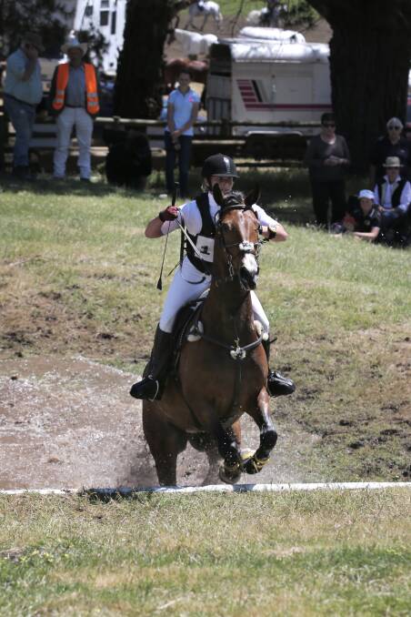 Bells Park Bella Donna, ridden by Debra Pace, competes in the cross-country on Saturday.