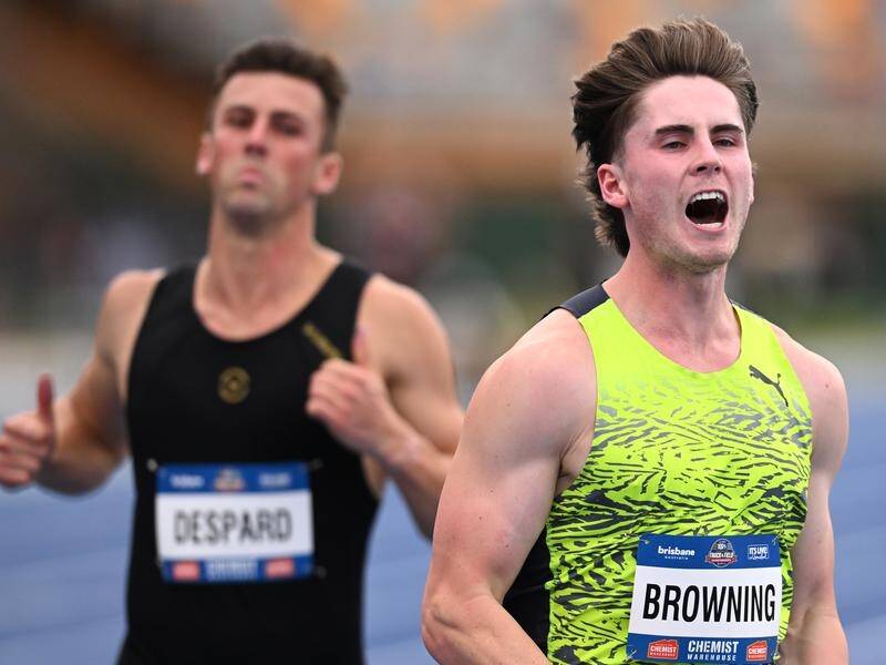 Rohan Browning celebrates his flying time of 10.02 seconds in the 100m at the Australian titles. (Darren England/AAP PHOTOS)