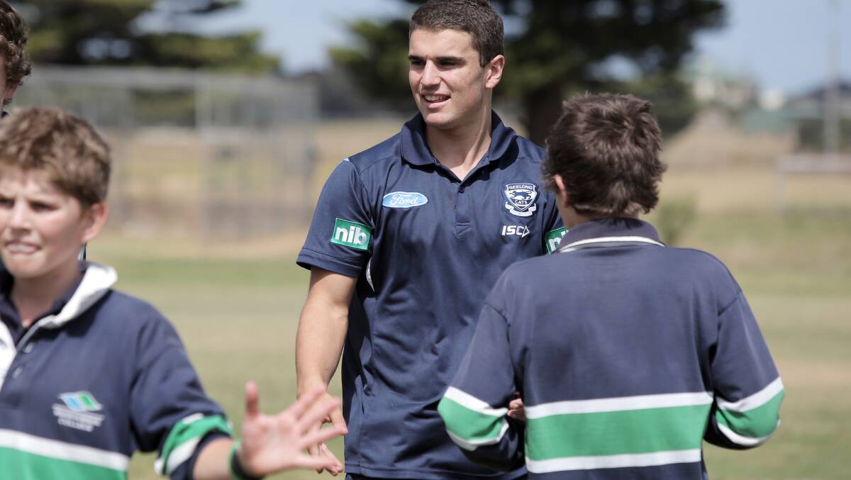 Michael Luxford was among the Geelong players helping out at a visit to Warrnambool College as part of the region's Auskick launch yesterday.