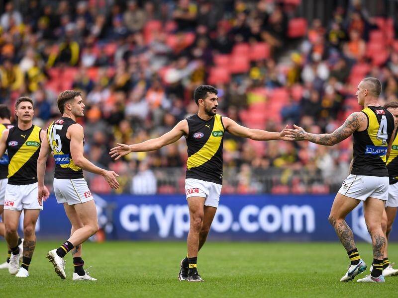 Marlion Pickett (C) kicked the winning goal for Richmond in the Tigers' six-point AFL win over GWS. (Steven Markham/AAP PHOTOS)