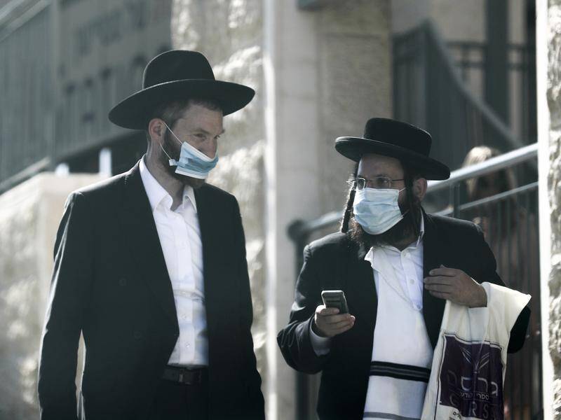 Israel reopened schools and many businesses in May but its infection rate jumped in recent weeks.