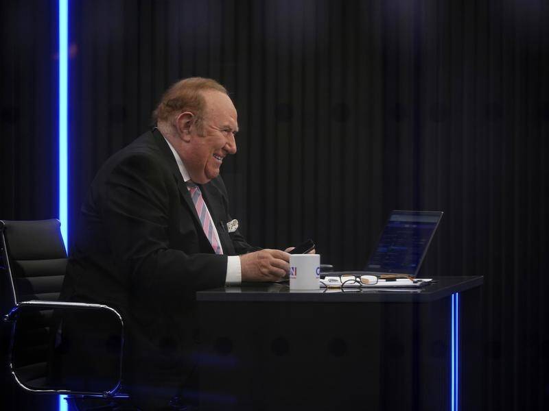 Presenter Andrew Neil prepares to broadcast at a launch event for new TV channel GB News in London.