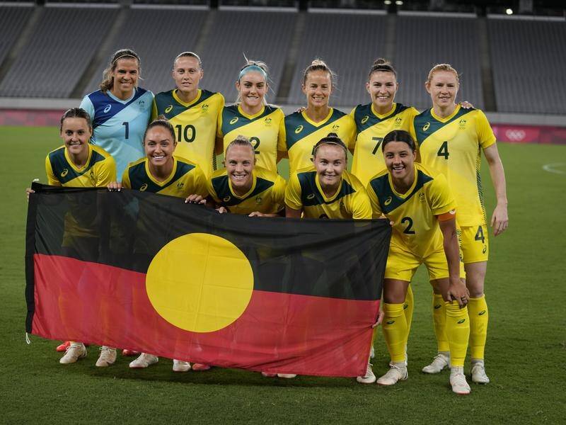 Patty Mills has praised the Matildas for proudly standing behind the Aboriginal flag at the Games.