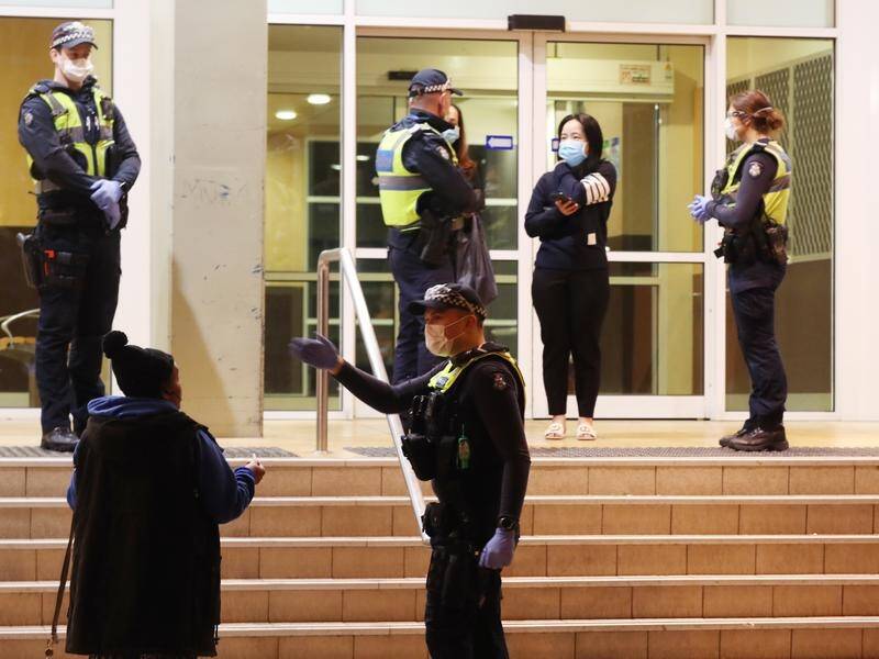 Hundreds of police officers are implementing a lockdown of public housing towers in Melbourne.
