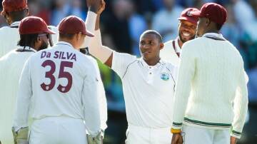 Devon Thomas, here celebrating his first Test wicket, has proved a surprise hit for the West Indies. (Matt Turner/AAP PHOTOS)
