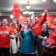 Excited Labor supporters react party reception in Melbourne as the results came through. (James Ross/AAP PHOTOS)
