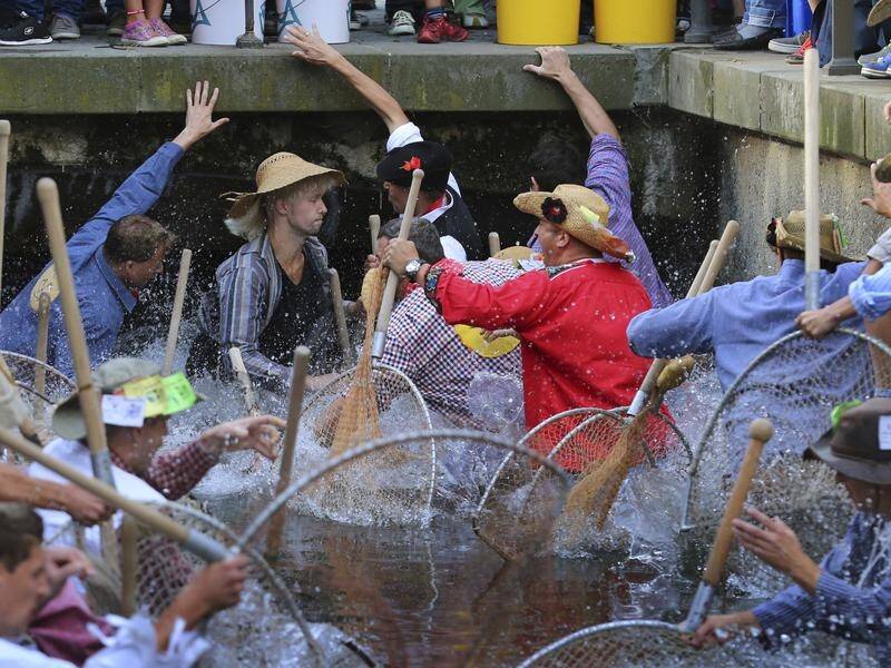 A German court says women can join a fishing contest that's been men-only since the 16th century.