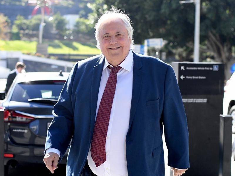 Clive Palmer wants his trial with Queensland Nickel's liquidators stayed after a major settlement.
