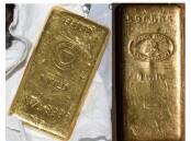 Gold bars and envelopes full of case were found in the house of New Jersey Senator Robert Menendez. (EPA PHOTO)