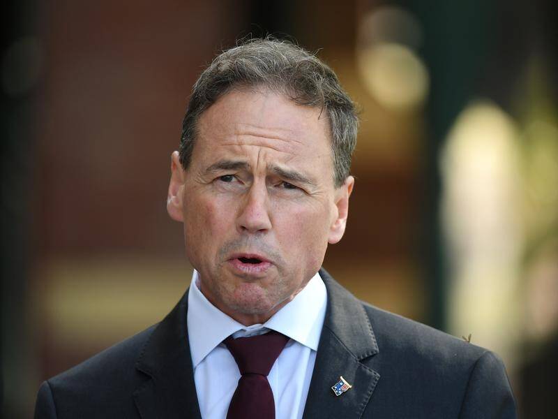 Greg Hunt insists antibody kits will work but he will wait for experts to evaluate them first.