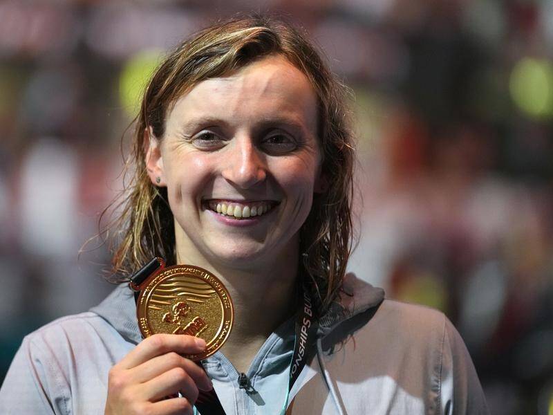 Katie Ledecky clutches her 19th world championship gold after her 800m freestyle win.