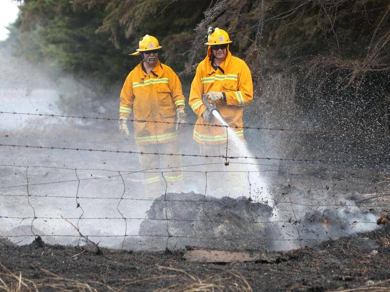 Milder conditions are bringing relief to Victorian firefighters battling two major blazes.