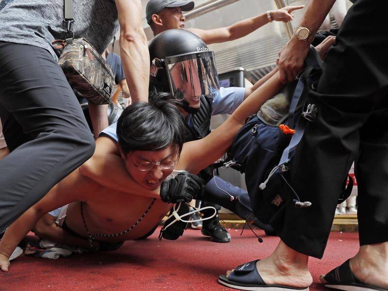 Hong Kong police have responded to demonstrators with tear gas, rubber bullets and water cannons.